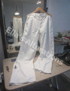 Clean Trouser Hem Resting Just Above A Pair Of Oxfords