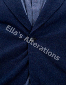 Jacket hem riding up on arm lift;